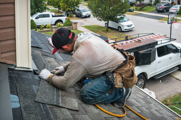Professional Roofing technician working in Meredith, NH